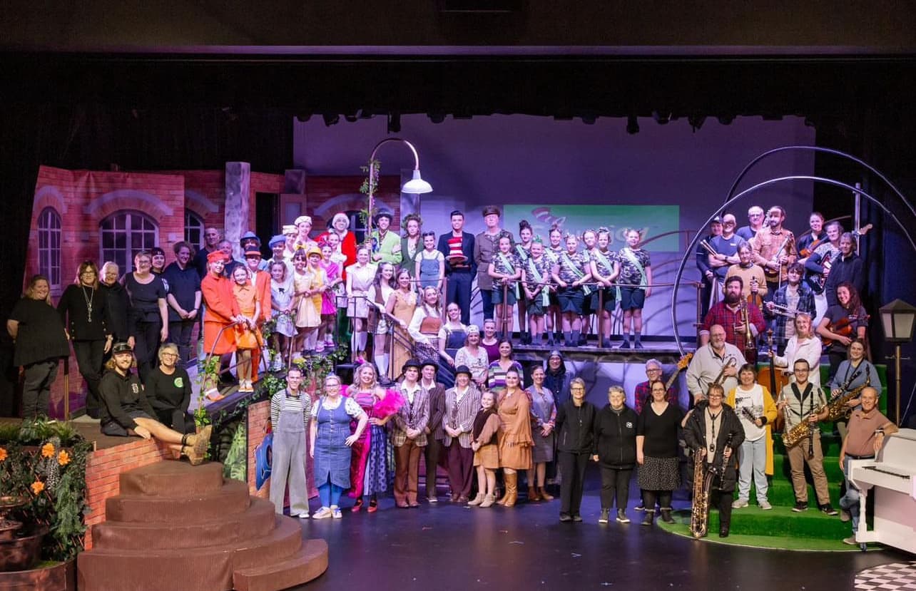 Group theatrical photo on stage