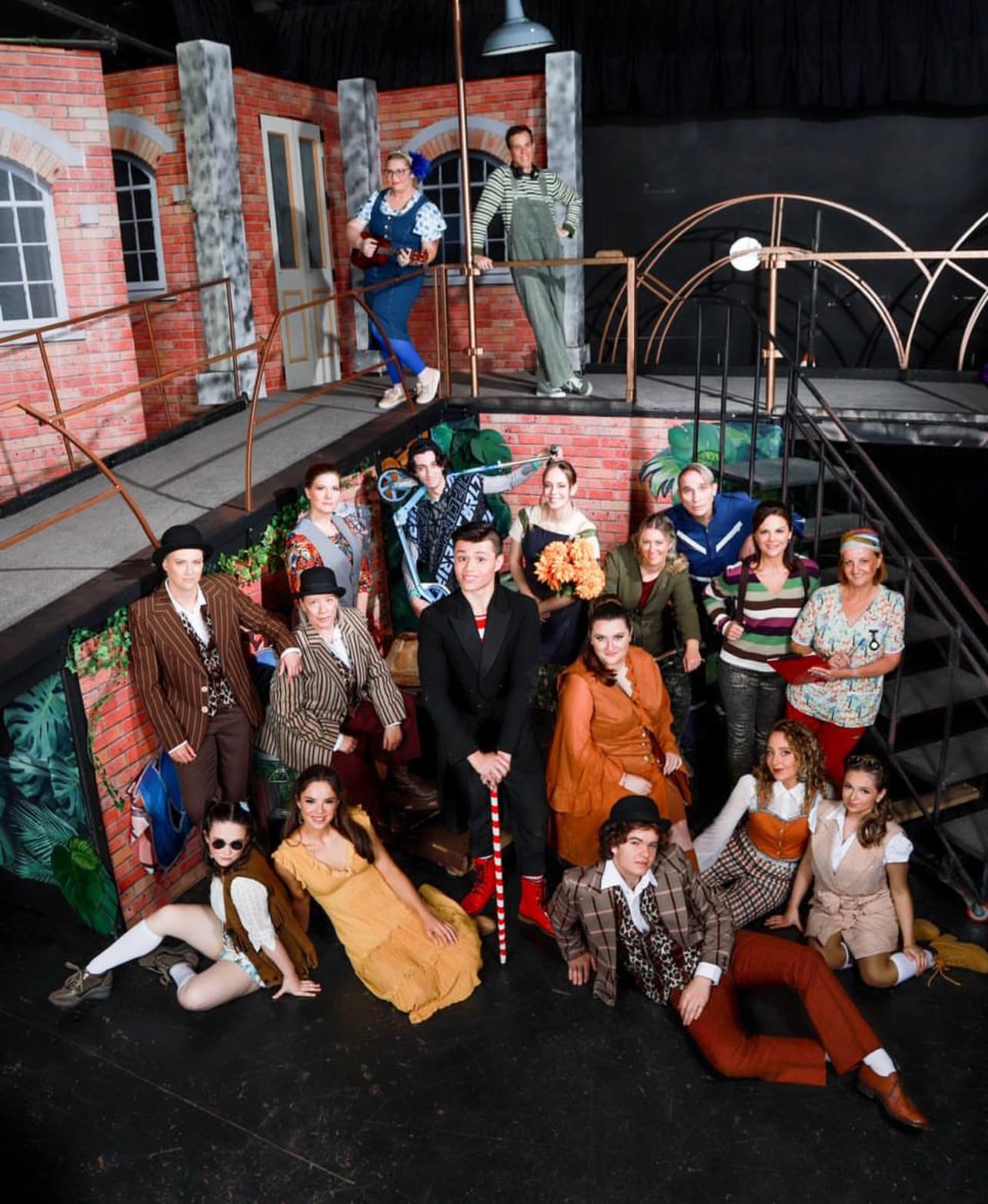 Group theatrical photo on stage